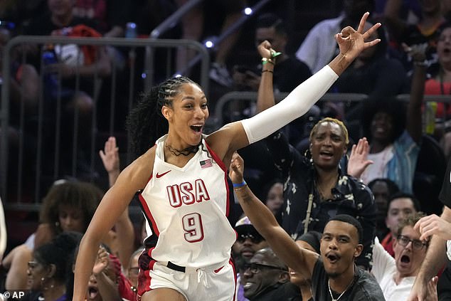 Team USA's A'ja Wilson celebrates after scoring a three-point basket against the WNBA team