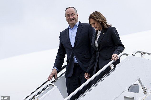 Vice President Kamala Harris (right) and second gentleman Doug Emhoff (left) arrive in Wilmington, Delaware, on Monday afternoon to appear before the Biden-Harris campaign staff as the vice president takes over the campaign operation.