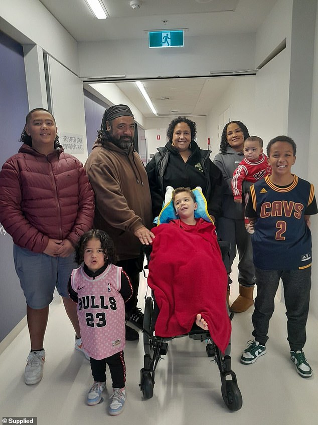 Cruz's family currently has no income, as his mother stays by his side and his stepfather is on unpaid leave to care for the children at home. (Pictured: Cruz with his siblings and step-siblings)