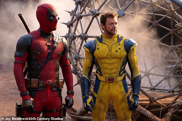 Deadpool & Wolverine is set to hit theaters on July 26; Reynolds and Jackman appear in a promotional image for the film