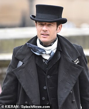 James' character was dressed elegantly in black.