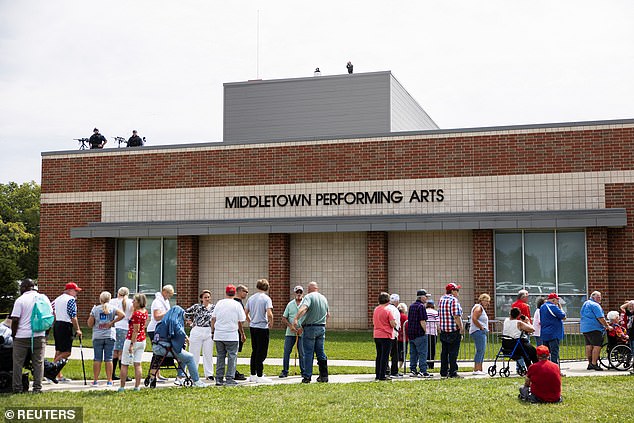 Supporters wait in line outside a rally for Republican vice presidential candidate U.S. Sen. JD Vance (R-OH) at Middletown High School in his hometown of Middletown, Ohio.