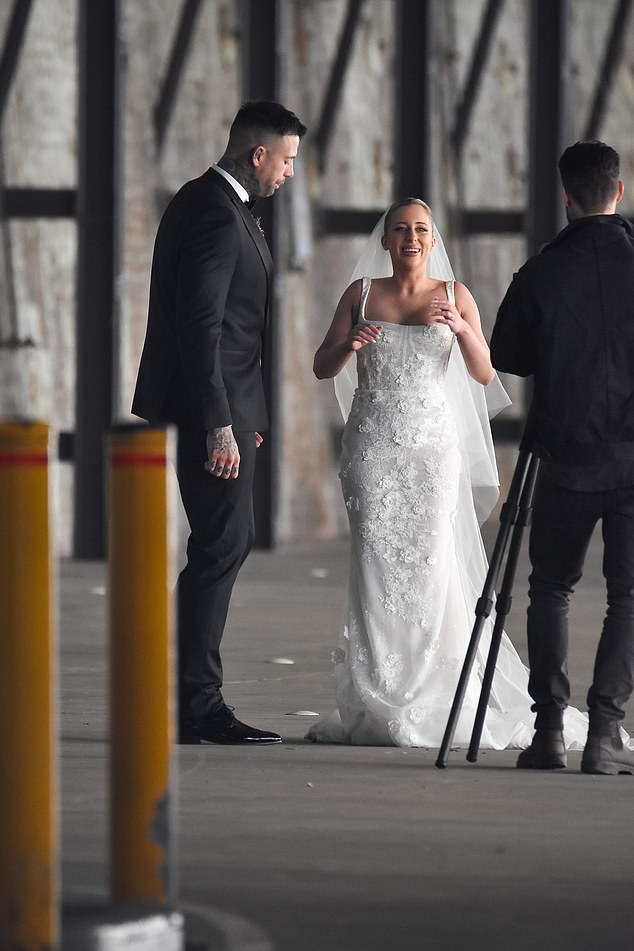 The groom, 36, from Victoria, stands a whopping 6.6 feet tall and owns his own caulking business.