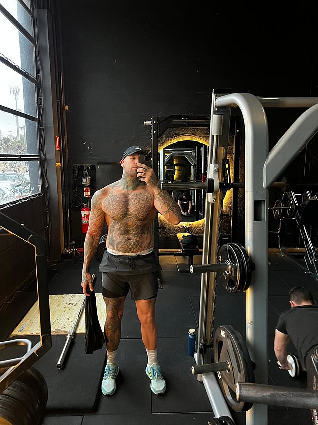 The tattooed hunk is a fan of gym workouts.