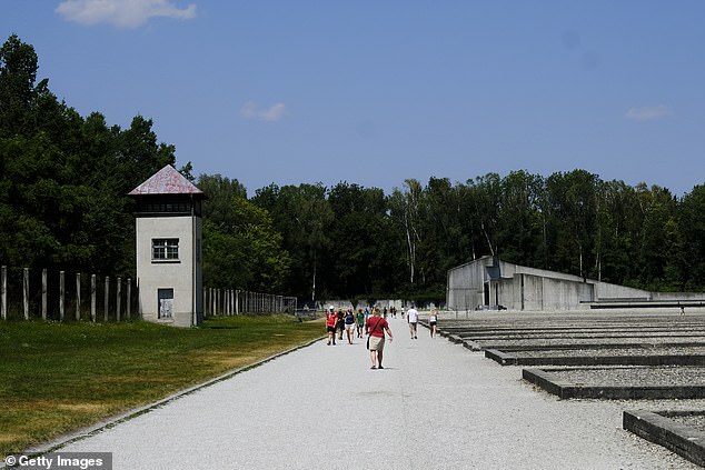 Visitors visit the Dachau concentration camp in Germany on July 25, 2022