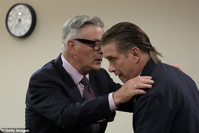 Alec (left) hugs his brother, actor Stephen, during his hearing at the Santa Fe County District Court on July 10 in Santa Fe, New Mexico.