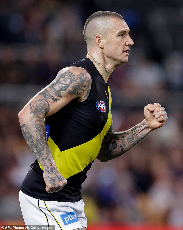 Martin is the uncle of Richmond Tigers star Dustin Martin (pictured on the pitch against the Brisbane Lions)