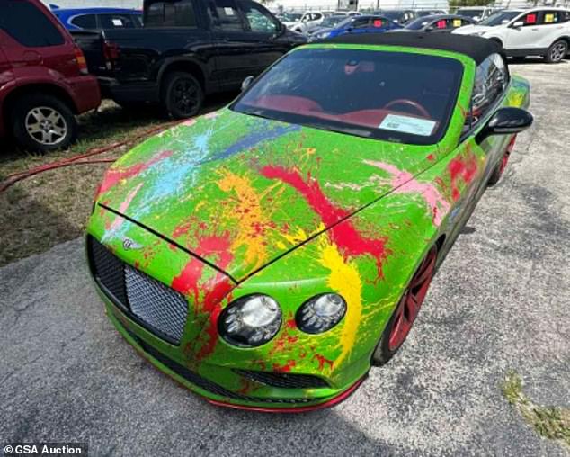 His customized 2017 Bentley Continental GT Speed, in green with a broken windshield, side windows and convertible top, sold for $85,000 at auction.