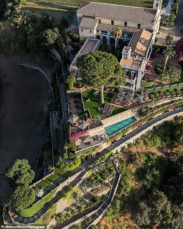 The proposal took place at a stunning cliffside mansion that featured a multi-level garden in Calabria, Italy.