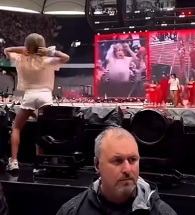 Taylor dances towards the toddler before giving him a hug in what has made for some very sweet moments on the record-breaking tour now delighting fans in Europe.