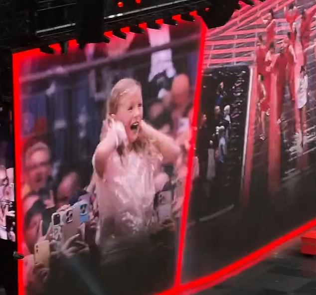 The adorable fan only stopped dancing once Swift was in front of her, and seemed overwhelmed with emotion as the pop star got down on one knee and gave her a big hug.