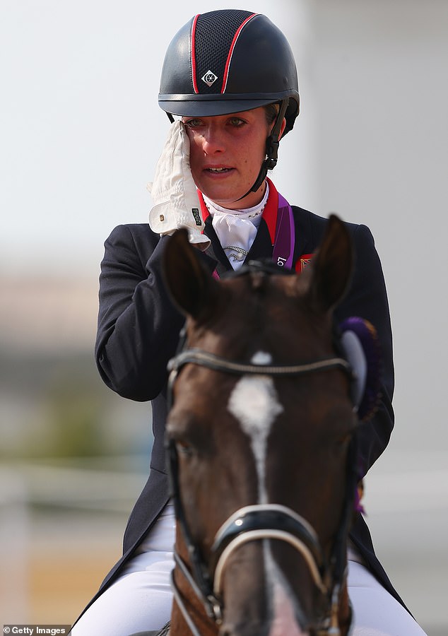 Dujardin (pictured at the 2012 Olympics) had hoped to become Britain's most decorated Olympian but was forced to withdraw from the Games on Tuesday.