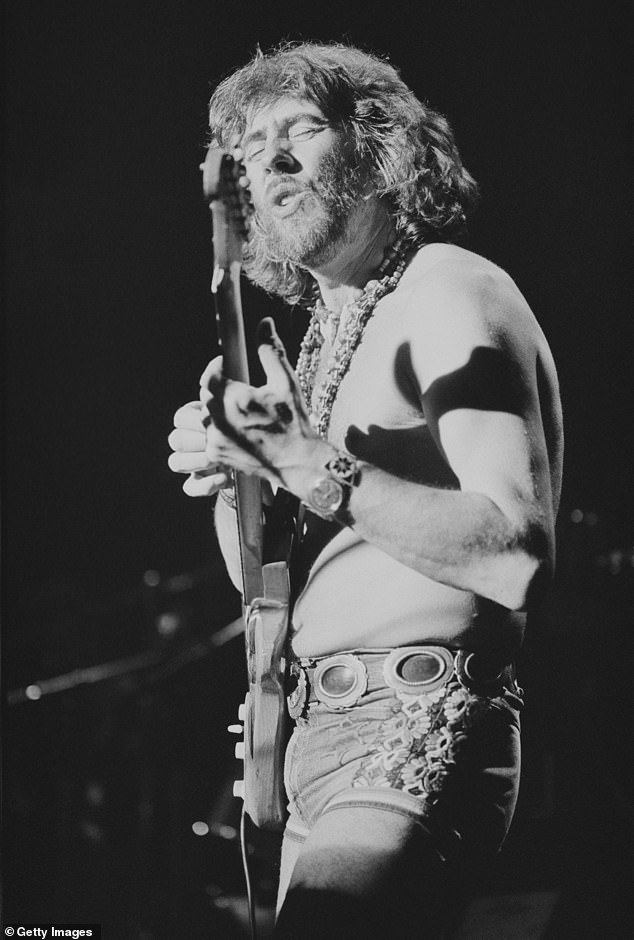 Mayall performing on stage in 1979