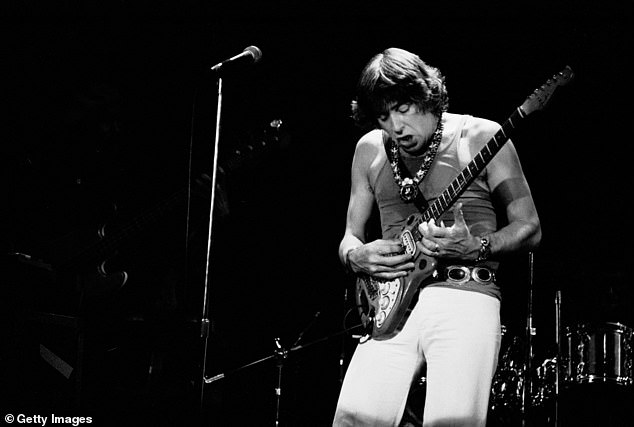 English blues and rock musician John Mayall performing on stage at the Bottom Line nightclub in Greenwich Village in 1979