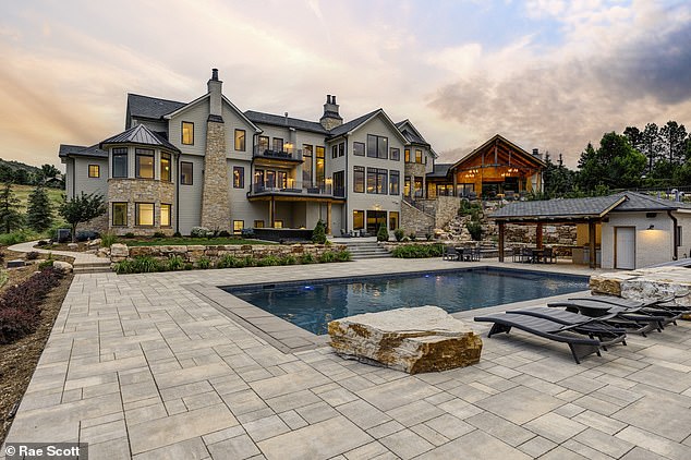 'White Deer Estate' is a Littleton wonder nestled in the hills with stunning views of red rock outcroppings and the Denver skyline.