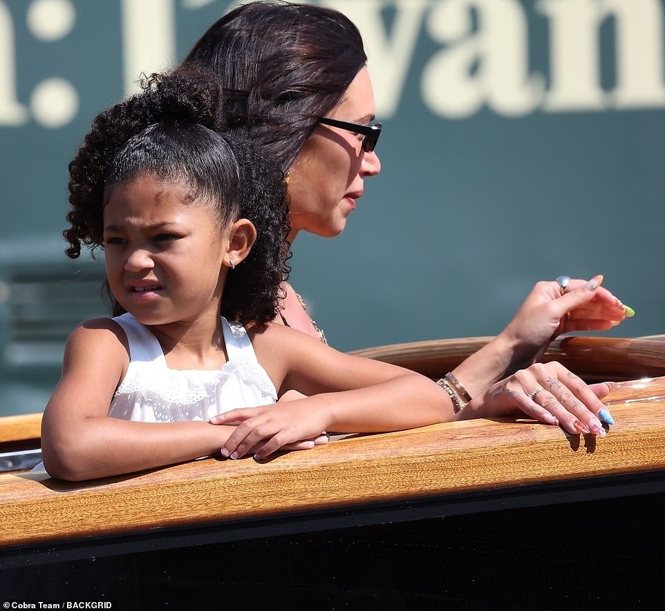 Little Stormi looked out at the open view as she rode in the water taxi alongside Stassie.