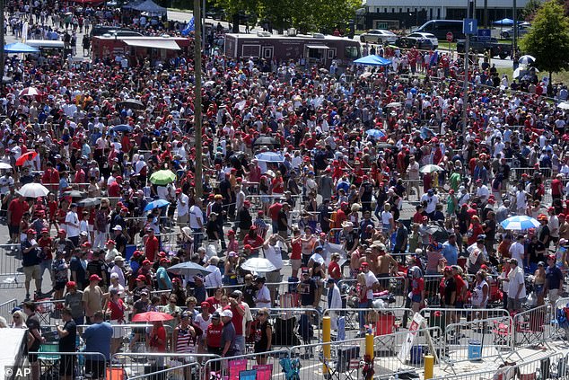 Huge crowds lined up in the North Carolina heat to see Trump speak in Charlotte, in his first rally since Biden dropped out