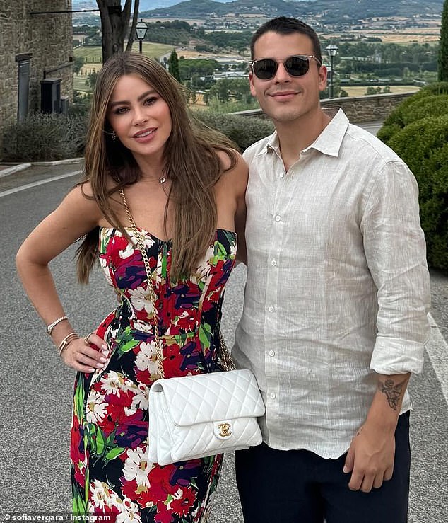 Vergara previously stunned in a tight red floral dress as she posed with the group in front of another gorgeous view.