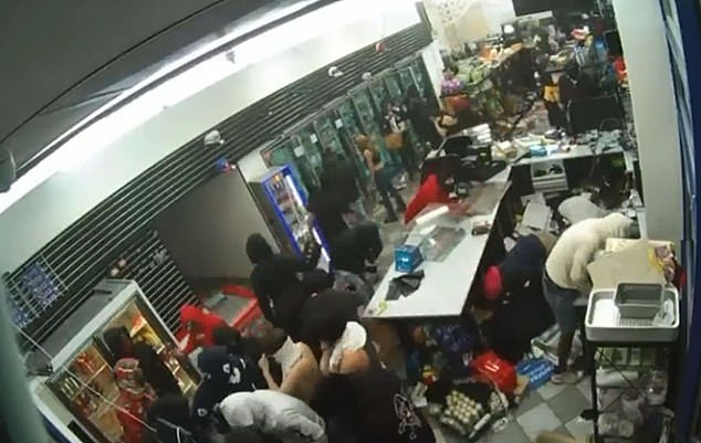 Around 100 robbers looted a gas station in Oakland, California, in the middle of the night.