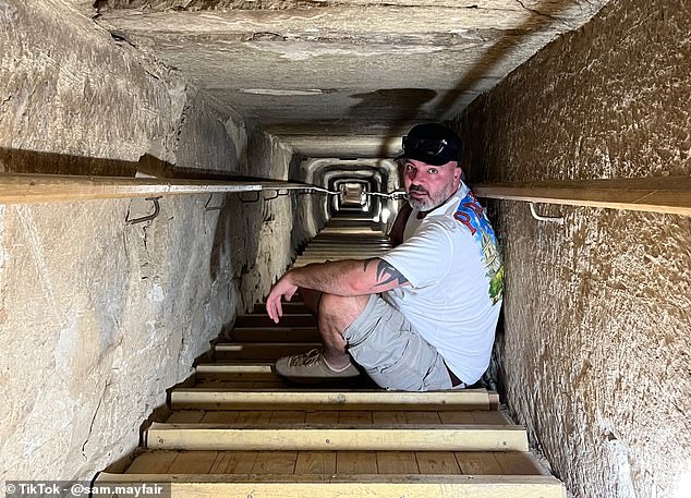 Cairo can serve as a base for a trip to the Bent Pyramid, which is about an hour's drive away. Sam is pictured exploring the interior of the structure.