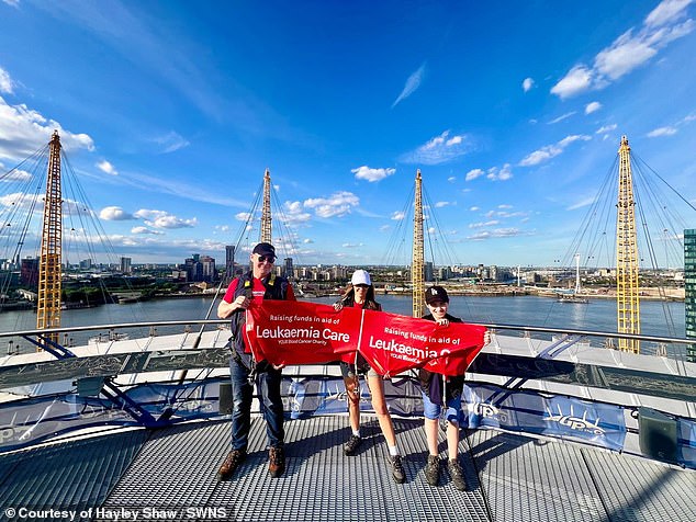 Hayley is pictured at the top of the O2 after her climb. The single mum revealed she had caught a virus the week before but still managed to pull off the incredible feat.