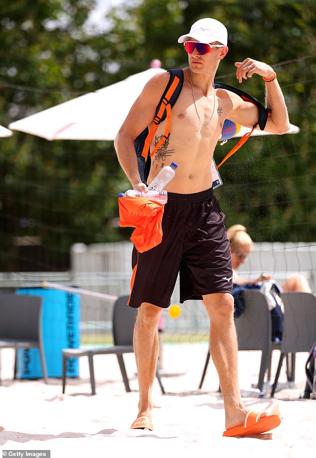 Van de Velde leaving the beach volleyball court in the shadow of the Eiffel Tower in Paris