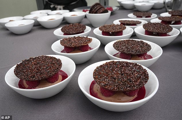 On display are plates of chocolate and raspberry mousse and crispy tiles from French chef Stéphane Chicheri, chief executive of Sodexo Live, whose company has a mission to serve 40,000 meals a day in the Olympic Village.