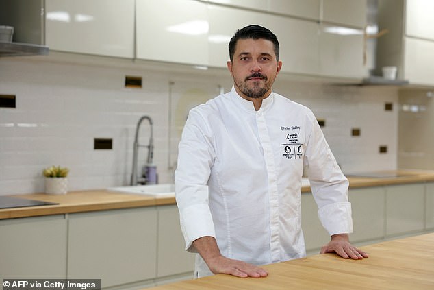 Executive Chef of the Paris 2024 Olympic and Paralympic Village, Charles Guilloy of Sodexo Live!, poses in Rungis, near Paris