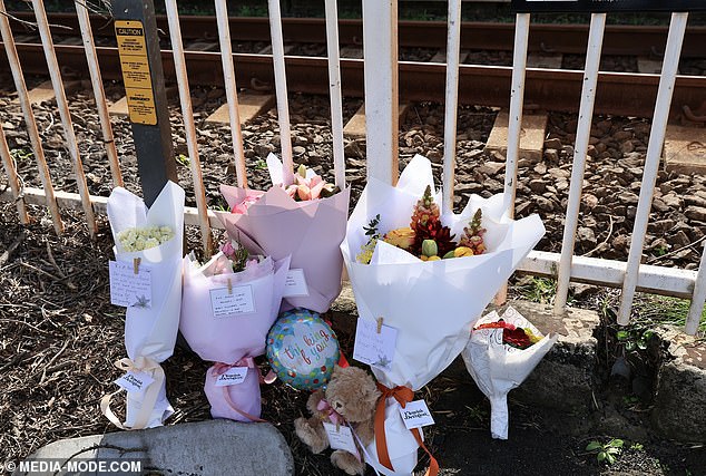 Tributes have been left at the station for Anand Runwal and his two-year-old daughter, Hilal.