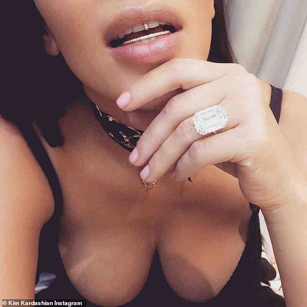 A gang of intruders violently broke into her hotel room and specifically demanded that she hand over a ring (pictured above) from her then-husband Kanye West.