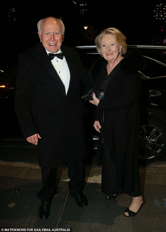 Former Prime Minister John Howard (pictured left) attended with his wife Jeanette (right)