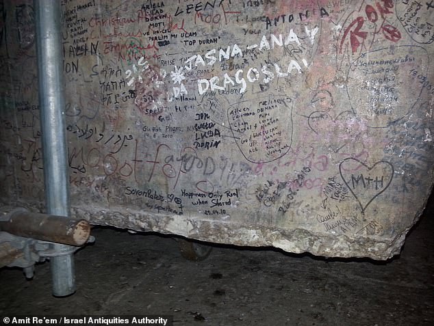 The discovery came after construction workers turned over a giant graffiti-covered stone slab that was leaning against the wall of the Church of the Holy Sepulchre, revealing a much older artistic heritage.