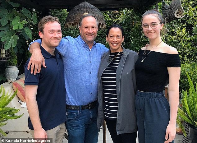 Kamala Harris with her husband Doug Emhoff and their two stepchildren Cole and Ella. Harris married her father in 2014