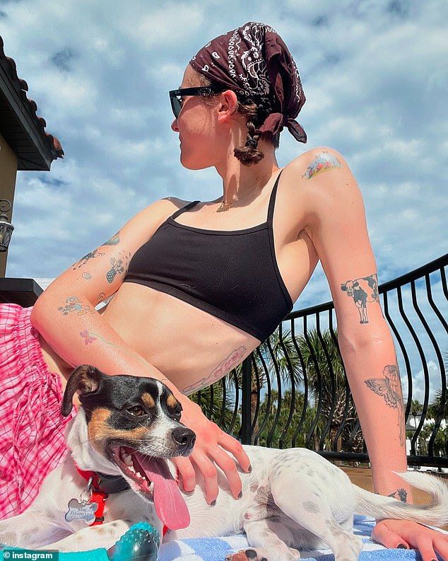 Artist and model Ella Emhoff, pictured above with her dog Jerry, on a trip to the beach and looking stylish on the ski slopes, has said of her upbringing: 