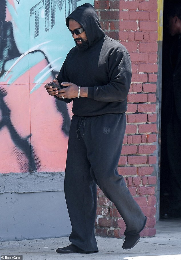 West, also known as Ye, joined his wife for lunch and opted for an all-black ensemble that included a black hoodie and comfy sweatpants.