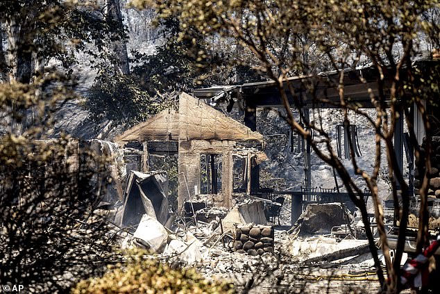 The fire has already destroyed some homes and other structures in its path.