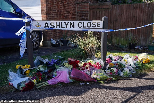 Tributes left for Chloe, Hannah and Louise Hunt at Ashlyn Close after they died in a crossbow attack