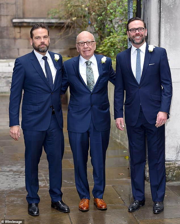 Pictured is Rupert Murdoch, centre, with his two sons Lachlan, left, and James, right.