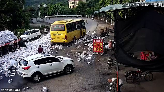 At the time of the incident, a yellow bus and a white hatchback were travelling. Fortunately, both vehicles stopped and no injuries were reported.