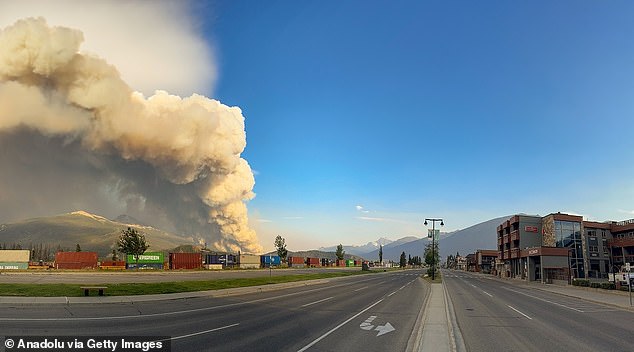 Smoke rises as wildfires continue to grow in Jasper National Park, Alberta, Canada, July 24, 2024