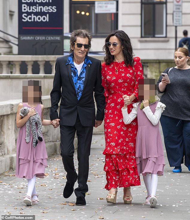 The couple attended the ceremony with their eight-year-old twin daughters, Gracie Jane and Alice Rose, who looked adorable in matching pink dresses.