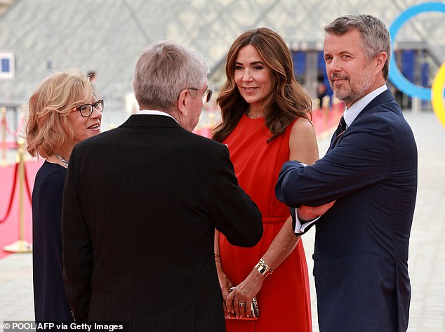 Queen Mary today looked the picture of health in a stunning red jumpsuit. Pictured here with Olympic Committee President Thomas Bach.