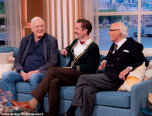 John, 84, appeared on This Morning on Friday alongside actors Adam Jackson-Smith (centre), who plays John, Basil, and Paul Nicholas (right), who plays The Major.