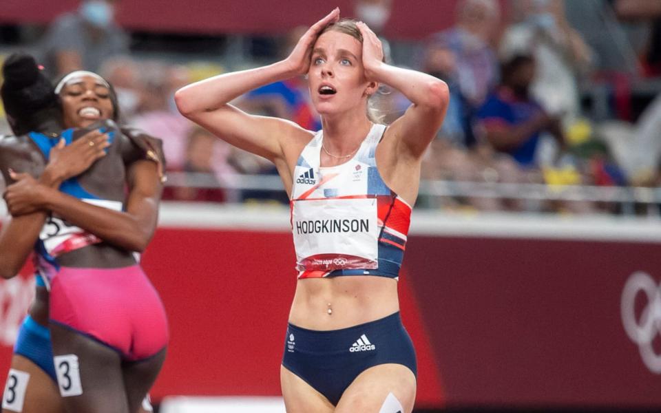 Keely Hodgkinson clutches her head in disbelief after winning silver in the 800m at the Tokyo Olympics