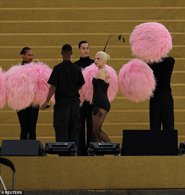 Gaga chatted with the crew during a break in rehearsals.