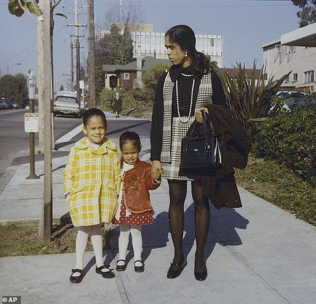 Kamala is seen as a child in January 1970, alongside her younger sister Maya and mother Shyamala, outside their home in Berkeley, California, before the Harris family moved to Canada.