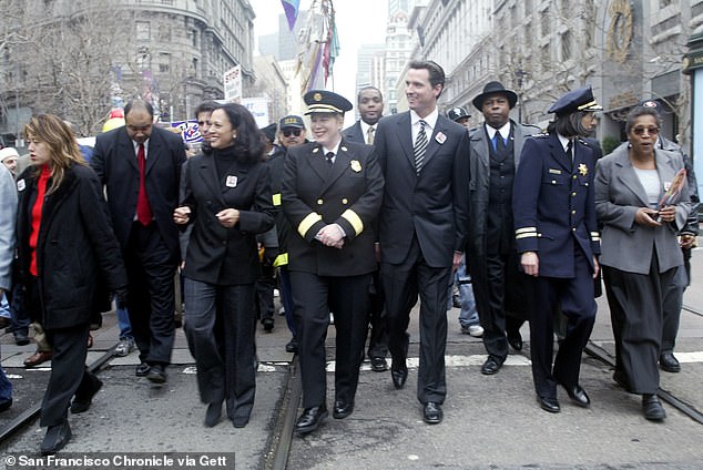 Kamala Harris, then San Francisco's district attorney, and then-mayor Gavin Newsom and others walk in the Martin Luther King, Jr. Freedom March in 2004.