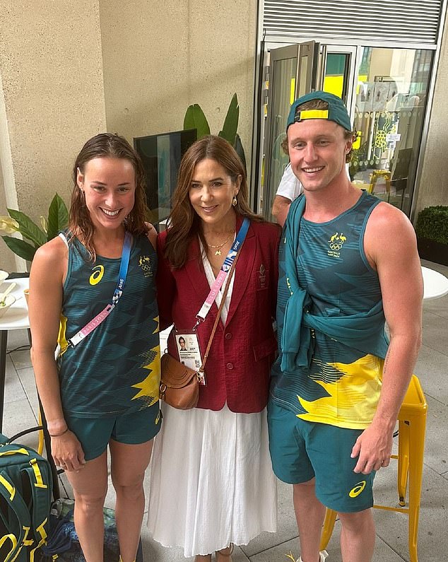 Athletes lined up to have their photos taken with Australian royalty at the Paris Village.