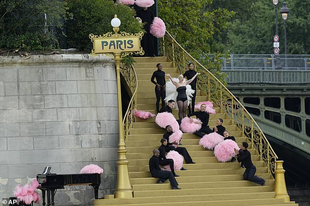 Lady Gaga opened the party by performing in front of 320,000 excited spectators gathered on the banks of the River Seine.