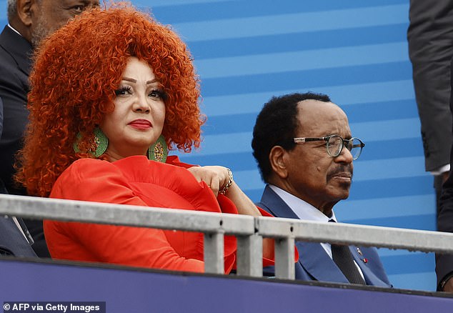 The real star of the show was Cameroon's First Lady, Chantal Biya, who stole all the attention with her gorgeous orange dress and matching orange hair.